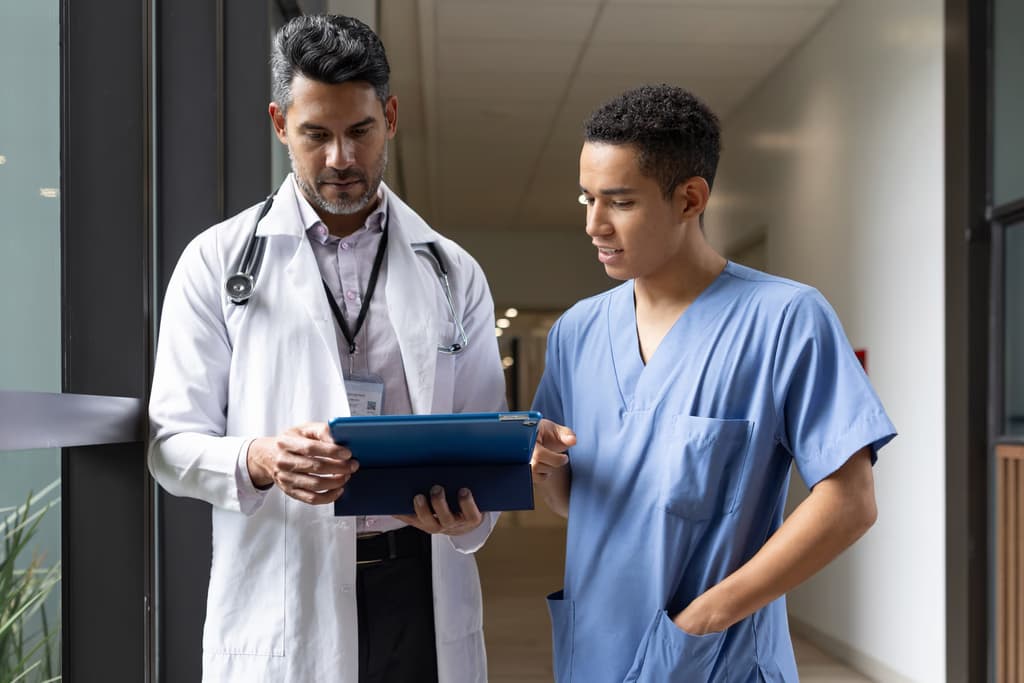 Doctors reviewing patient information